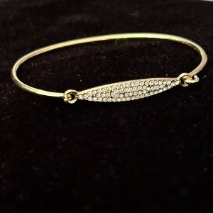 Clear Crystals Set in Gold Tone Latch Bangle Bracelet